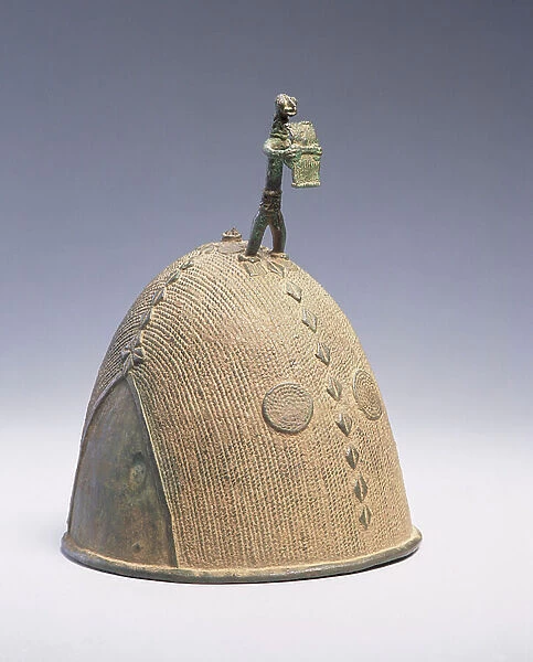 Helmet surmounted by a figure, Koma-Builsa, Ghana (bronze)