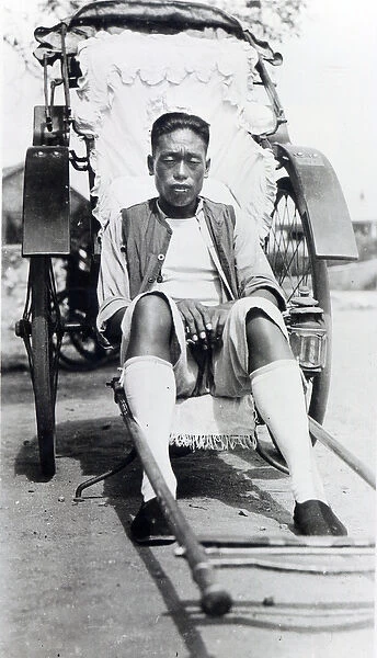 Rickshaw man at rest, 1936 (b  /  w photo)