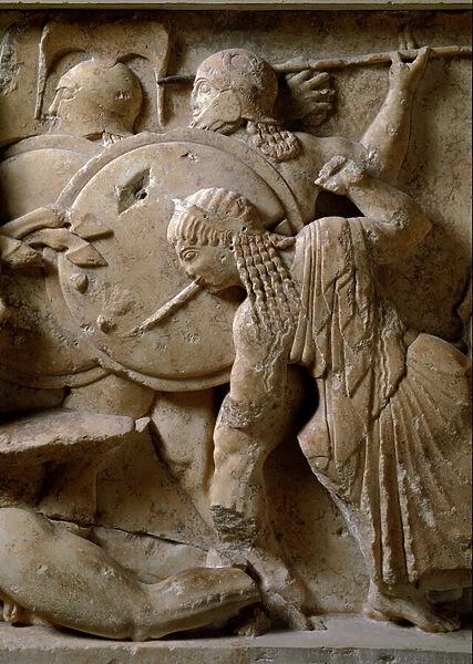 Scene of the Gigantomachy: Ares and Hermes fighting the dragon. 525 BC (relief)