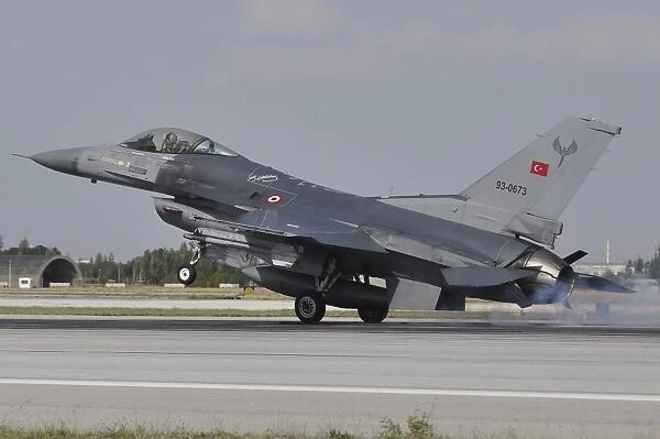 A Turkish Air Force F-16C landing on the runway at Konya Air Base, Turkey