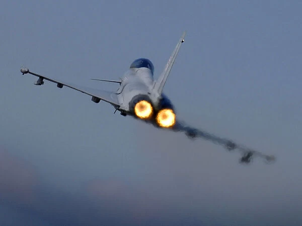 A Typhoon F2 fighter jet pilot applies the throttle as the aircraft pulls away