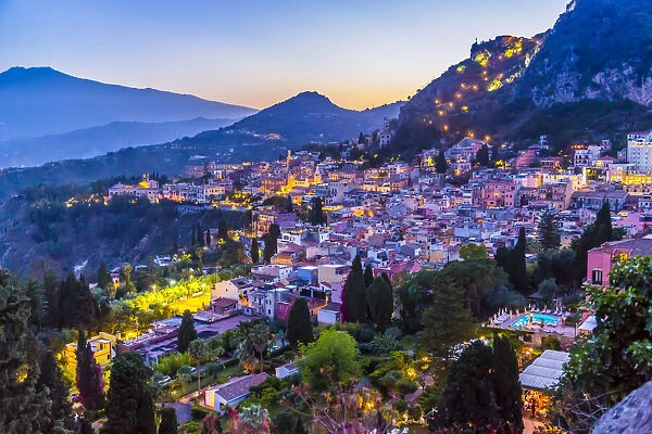 Overview of Taormina at Dusk with Mount Etna in the background, Sicily, Italy