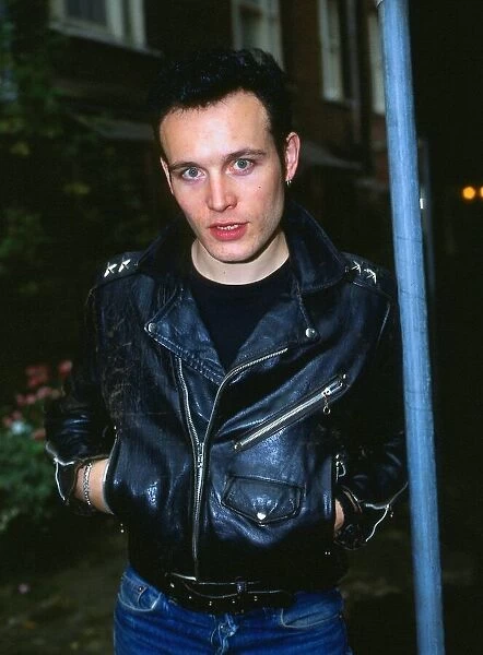Adam Ant pop singer September 1984 Black leather jacket hands in pockets