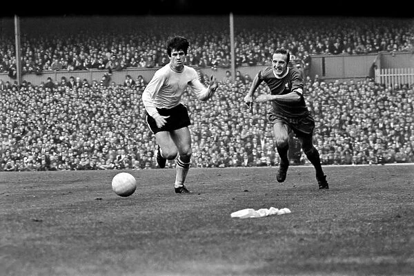 Derby v. Liverpool. Ron Webster and Peter Thompson battle for the ball