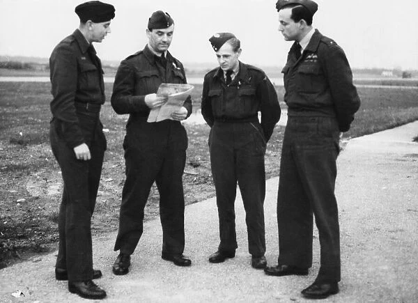 Flying Officer R. Harvey, Squadron Leader A. G. Williams, Flight Sergeant A