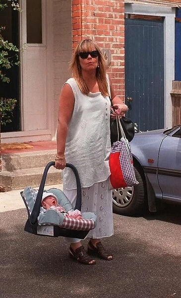 Linda Robson actress poses with her new baby today