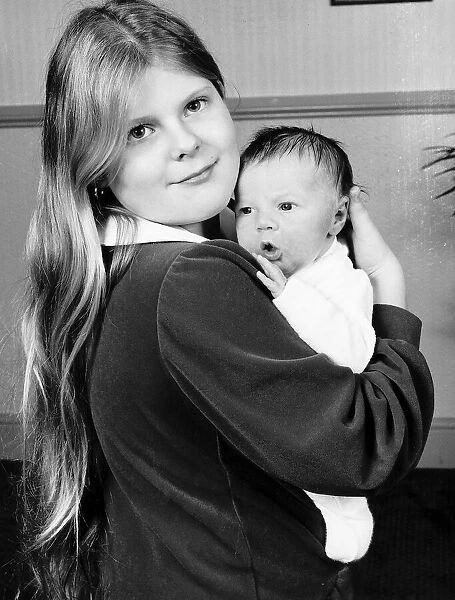 Louise Brown the Worlds first test tube baby holding Matthew Shepherd the 1000th