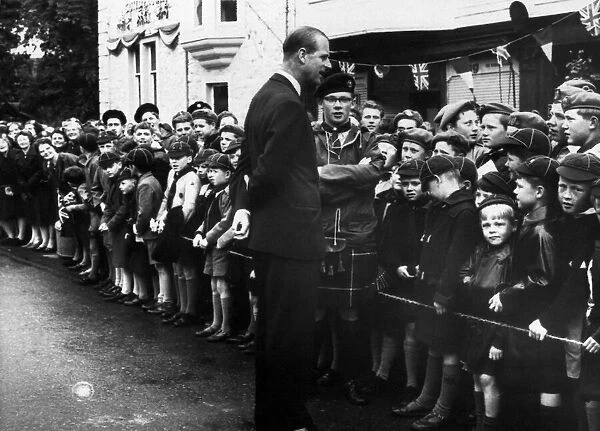 Prince Philip speaking to wolf cubs in Kirkcudbright in Scotland after he had attended St
