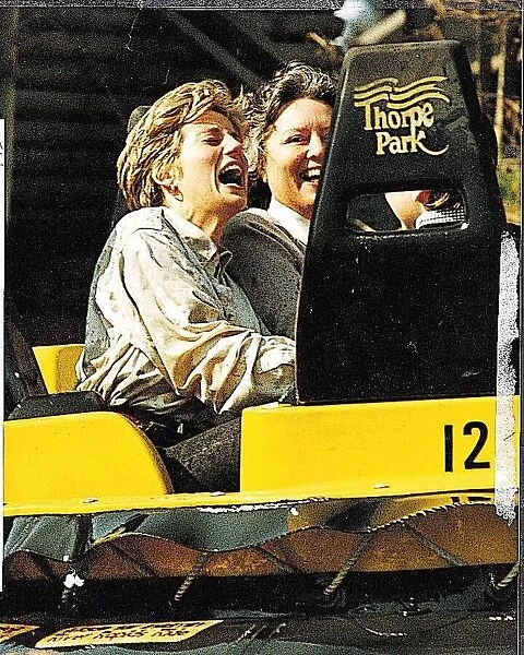 Princess Diana laughing and getting soaked on the Thunder River boat ride in Thorpe Park