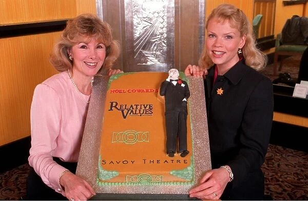 SUSAN HAMPSHIRE AND SANDRA DICKINSON IN PROMOTIONAL SHOOT HOLDING CAKE PUBLICISING NOEL