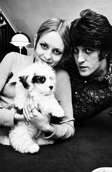 Twiggy model and actress with boyfriend and manager Justin de Villeneuve and puppy