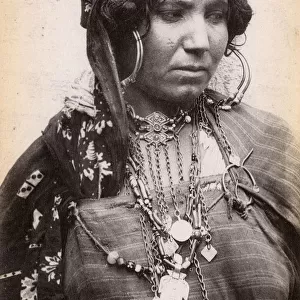 Algeria - A Nomadic Woman with extensive jewellery