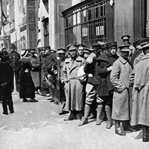 Belgian soldiers wait for railway passes, WW1