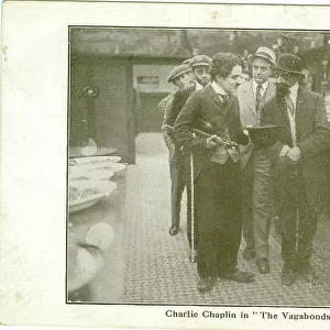Charlie Chaplin with members of the cast of The Vagabonds