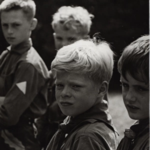 Four German boy scouts on an outdoor activity