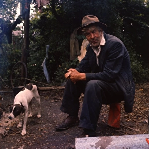 Gipsy man and his pet dog