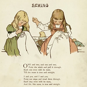 Two girls sewing