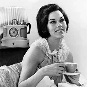 A glamorous female model with her trusty Goblin Teasmade