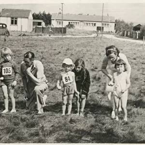 Group of children lining-up on the starting line for a race