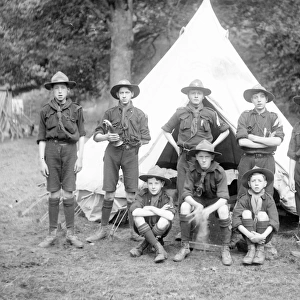 Group of scouts in front of a tent