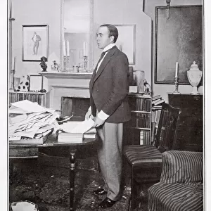 Max Beerbohm (1872 - 1956), writer and dramatist, pictured in his study at home in 1905