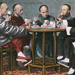 Five men sharing a meal, China
