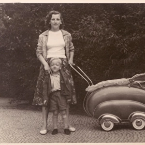 Mother and son with a streamlined Pram