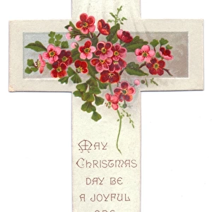 Pink and red flowers on a cross-shaped Christmas card