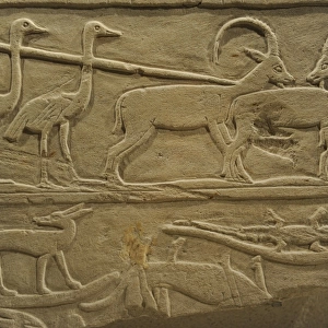 Relief depicting a hunting scene with ostrichs and ibexes. E