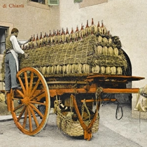 Wagon laden with fiasco Chianti bottles