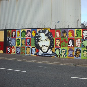 Wall mural of colourful images of people at Belfast