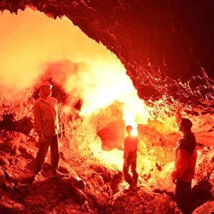 Tourists near lava cave, Russia C017 / 8273