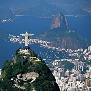 Aerial view of city with the Cristo Redentor (Christ the Redeemer) statue in foreground