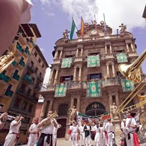 Clubs parade, San Fermin festival, and City Hall building, Pamplona, Navarra