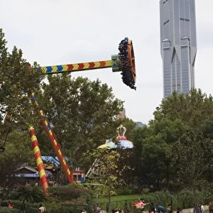 Funfair rides at Peoples Square, Shanghai, China, Asia