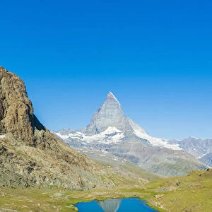 Lake Riffelsee with the Matterhorn in the background, Zermatt, canton of Valais, Swiss Alps