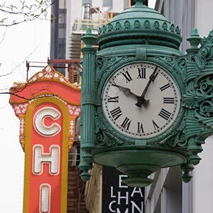 The Marshall Field Building Clock and Chicago Theatre behind, Chicago, Illinois