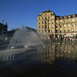 Modern fountain on Karlsplatz