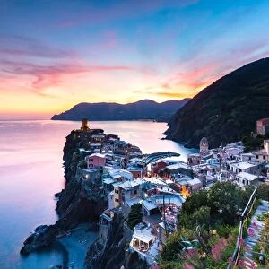The remains of a stunning sunset over the old town and harbour of Vernazza, Cinque Terre