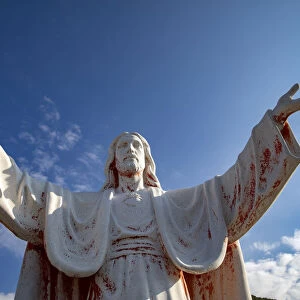 Statue of Jesus Christ with open arms in Delaj, Montenegro, Europe