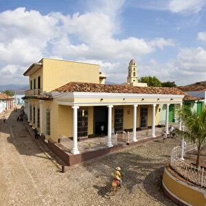 View from the balcony of the Galaria de Arts over Plaza Major towards the tower of Iglesia y Convento de San Francisco, Trinidad, UNESCO World Heritage Site, Cuba, West Indies