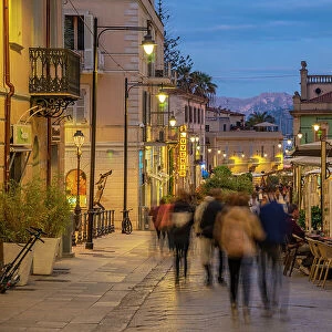 View of restaurants on Corso Umberto I at dusk in Olbia, Olbia, Sardinia, Italy, Mediterranean, Europe