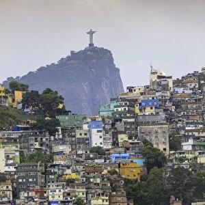 View of Rocinha favela (slum) (shanty town), Corcovado mountain and the statue of