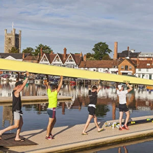 England, Oxfordshire, Henley-on-Thames, Town Skyline and Rowers on River Thames