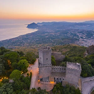 Erice, Sicily. Aerial of the Norman castle at sunrise, view towards Monte Cofano