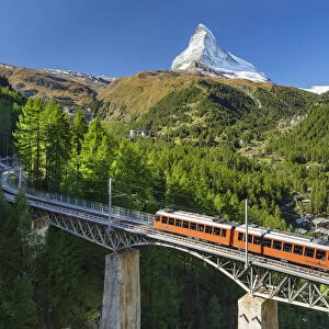 Gornergratbahn cog railway on Findelbach Bridge, Matterhorn (4478m) mountain, Valais, Swiss Alps, Switzerland
