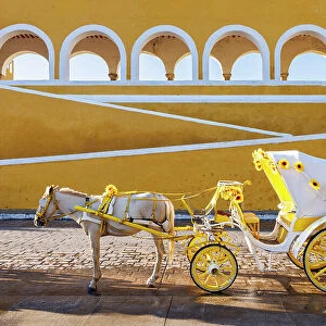 Horse and cart in front of Convent San Antonio de Padua, Izamal, Yucatan, Mexico