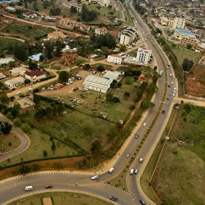 Kigali, Rwanda. A carefully modelled roundabout marks the beginning of the airport road