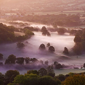 Mist lingers in the Usk Valley at dawn, Brecon Beacons National Park, Powys, Wales, UK