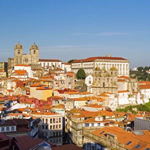 Portugal, Douro Litoral, Porto. An evening view of Se Cathedral and Igreja de Sao